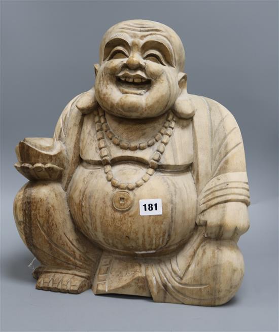 A carved wood figure of Buddha Height 40cm